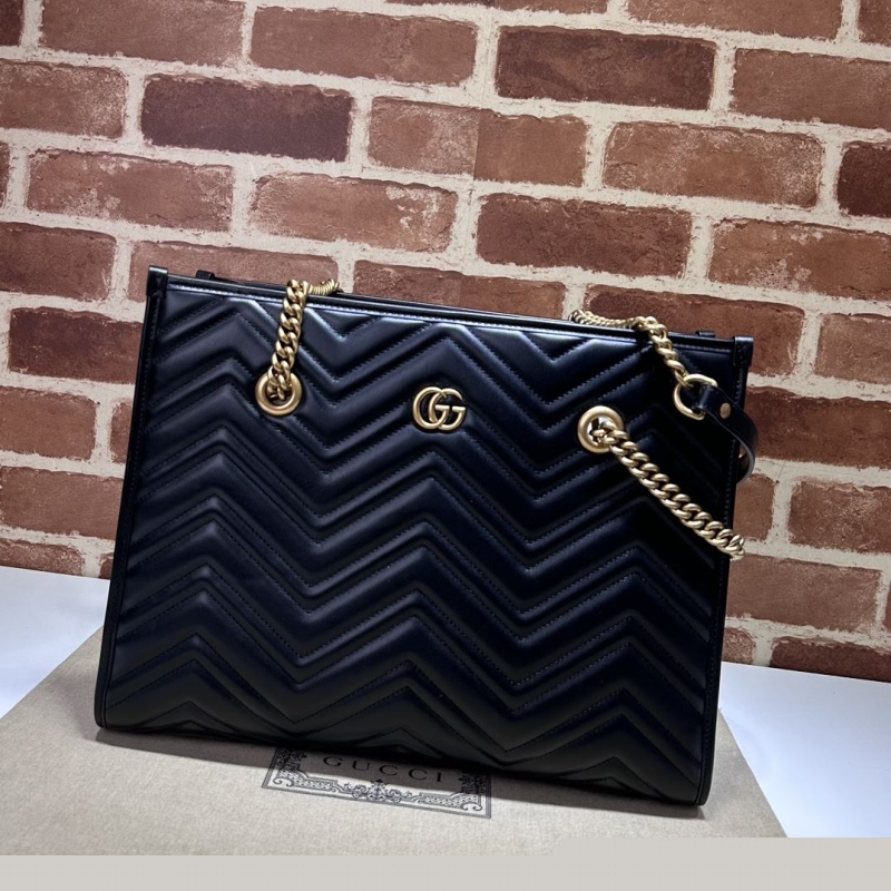 G*u*i shopping bags